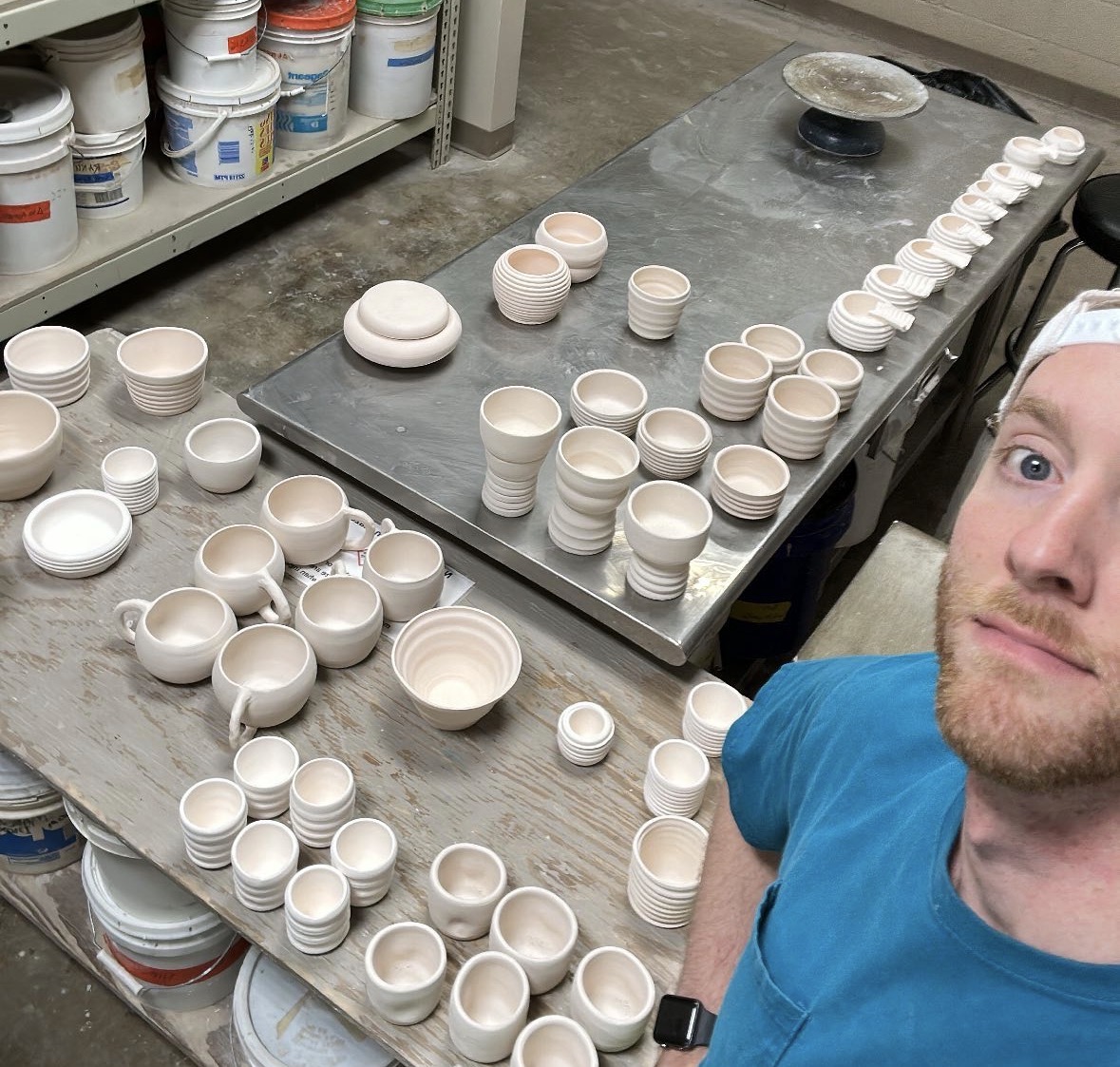 Joe in the studio surrounded by freshly thrown pieces
