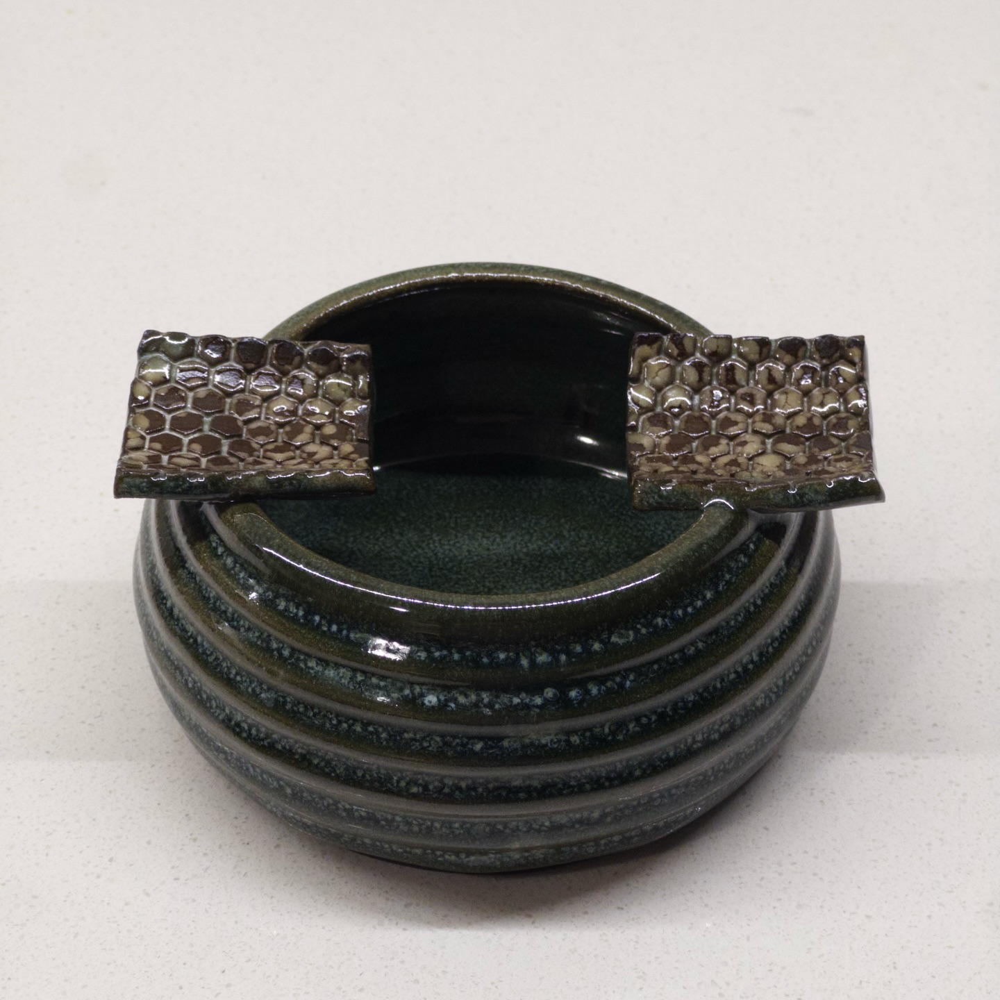 Ribbed incense holder with double honeycomb tabs, forest green glaze
